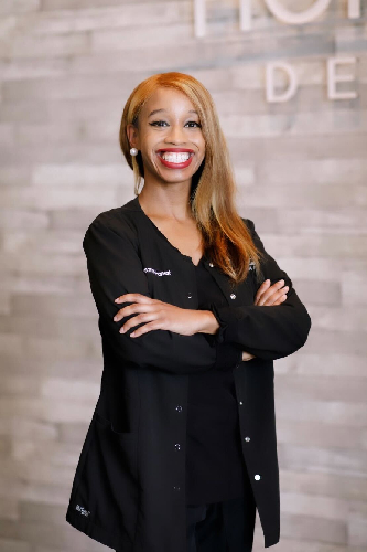 headshot of Neicy, employee at Horizon Dental CLT