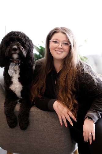 headshot of victoria, employee at Horizon Dental CLT and her dog